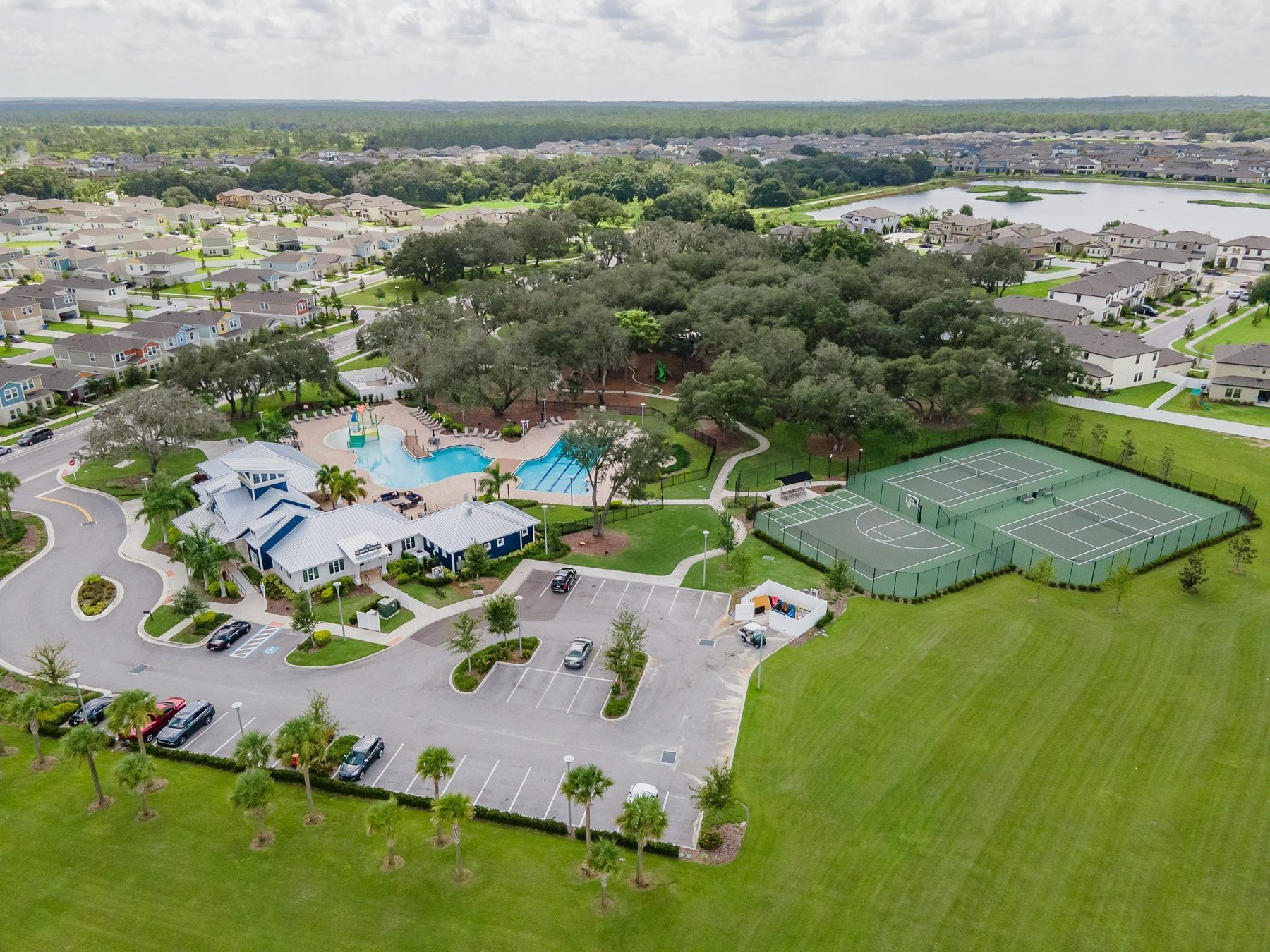 Triple Creek recreation area aerial with pools and sports courts
