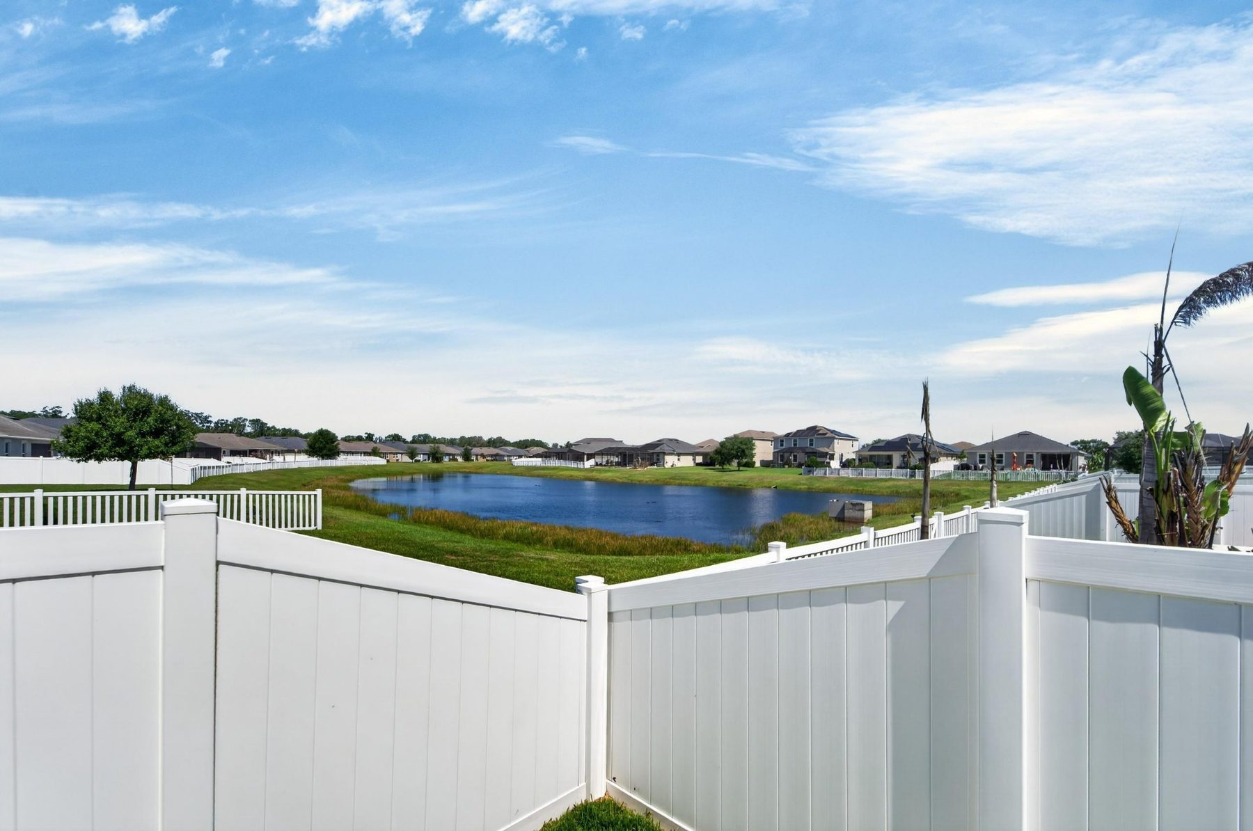Backyard lake view from 13517 Texas Sage Place