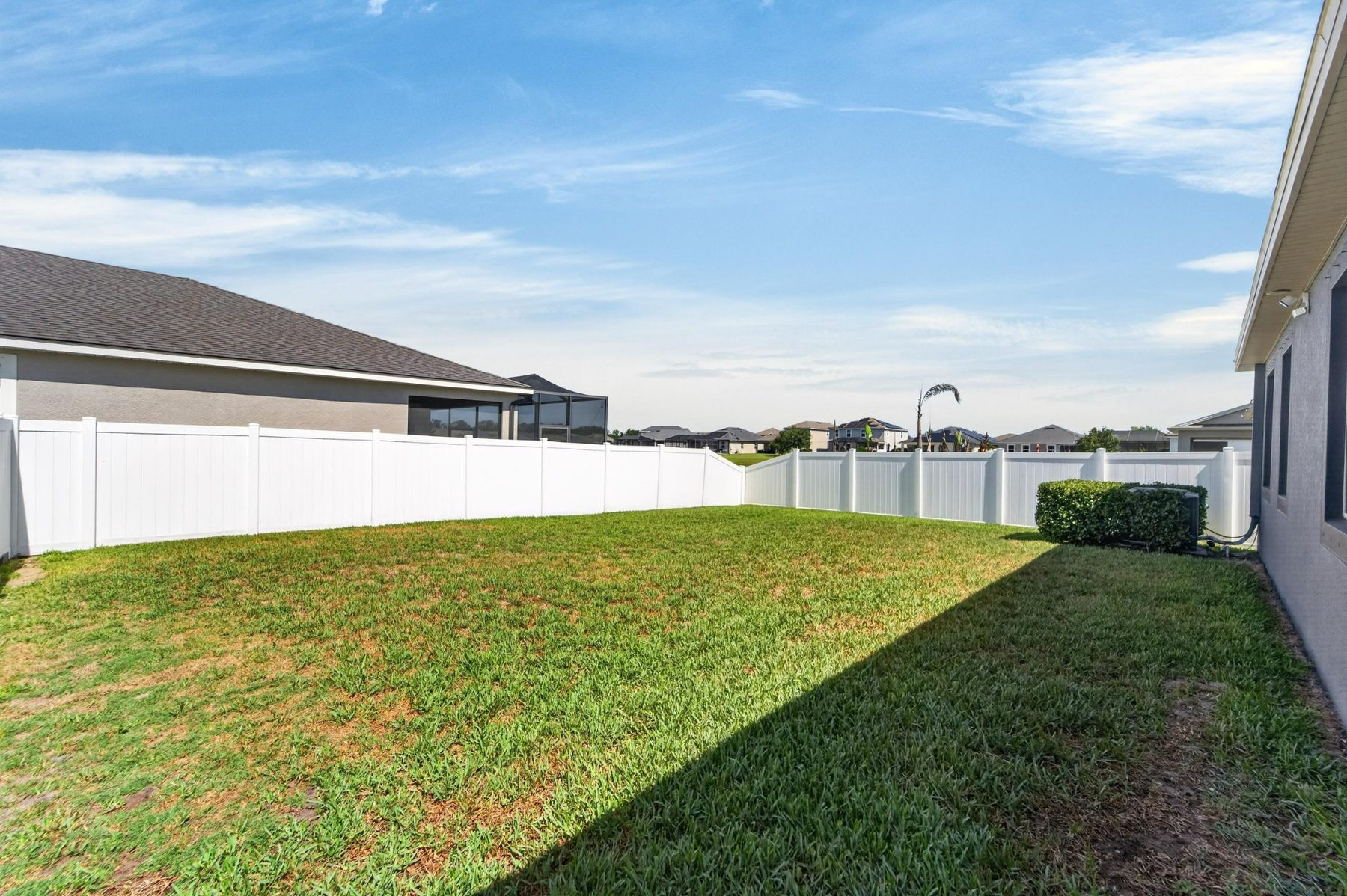 Side yard and fenced backyard at 13517 Texas Sage Place